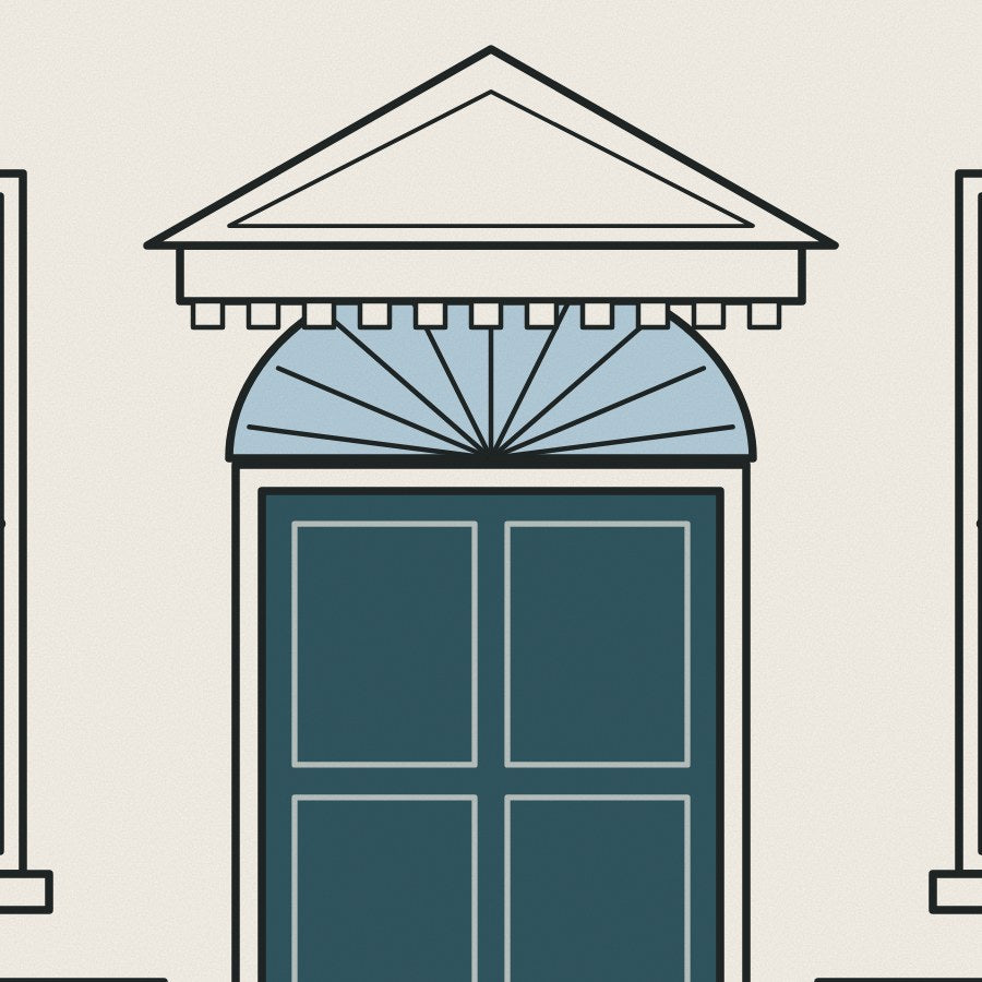 A pedimented doorway and fanlight, the classic Georgian entrance.